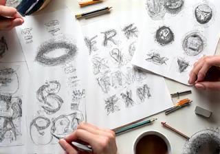 Sketches of logos and branding concepts